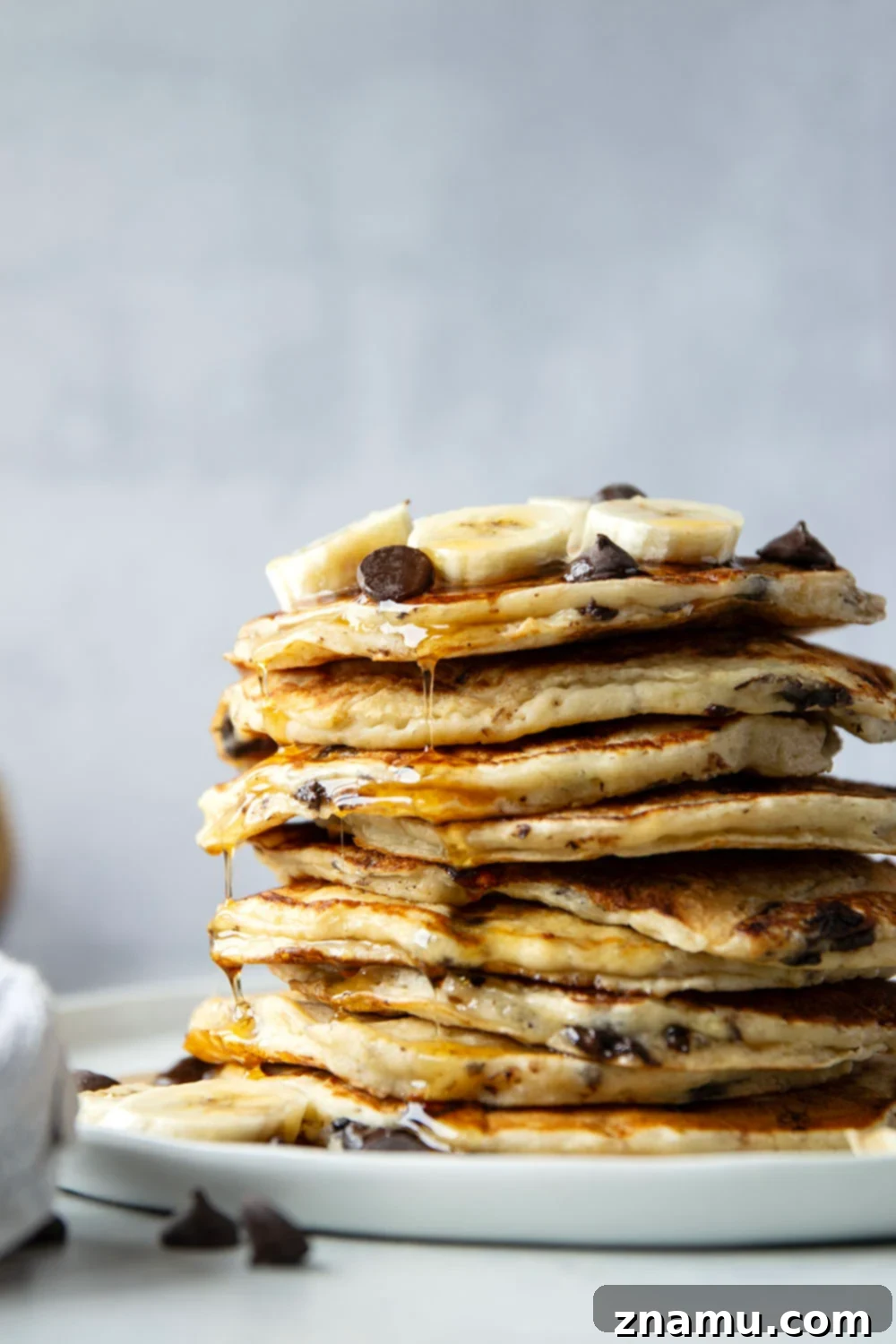 Fluffy Chocolate Banana Bliss 2 Loaded with gooey chocolate chips and lots of banana, these chocolate chip banana pancakes are thick, fluffy, and the ultimate breakfast treat!