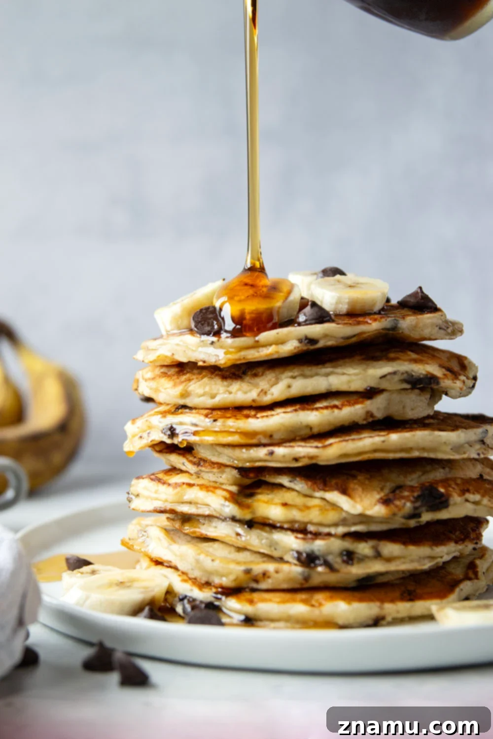 Fluffy Chocolate Banana Bliss 4 Loaded with gooey chocolate chips and lots of banana, these chocolate chip banana pancakes are thick, fluffy, and the ultimate breakfast treat!