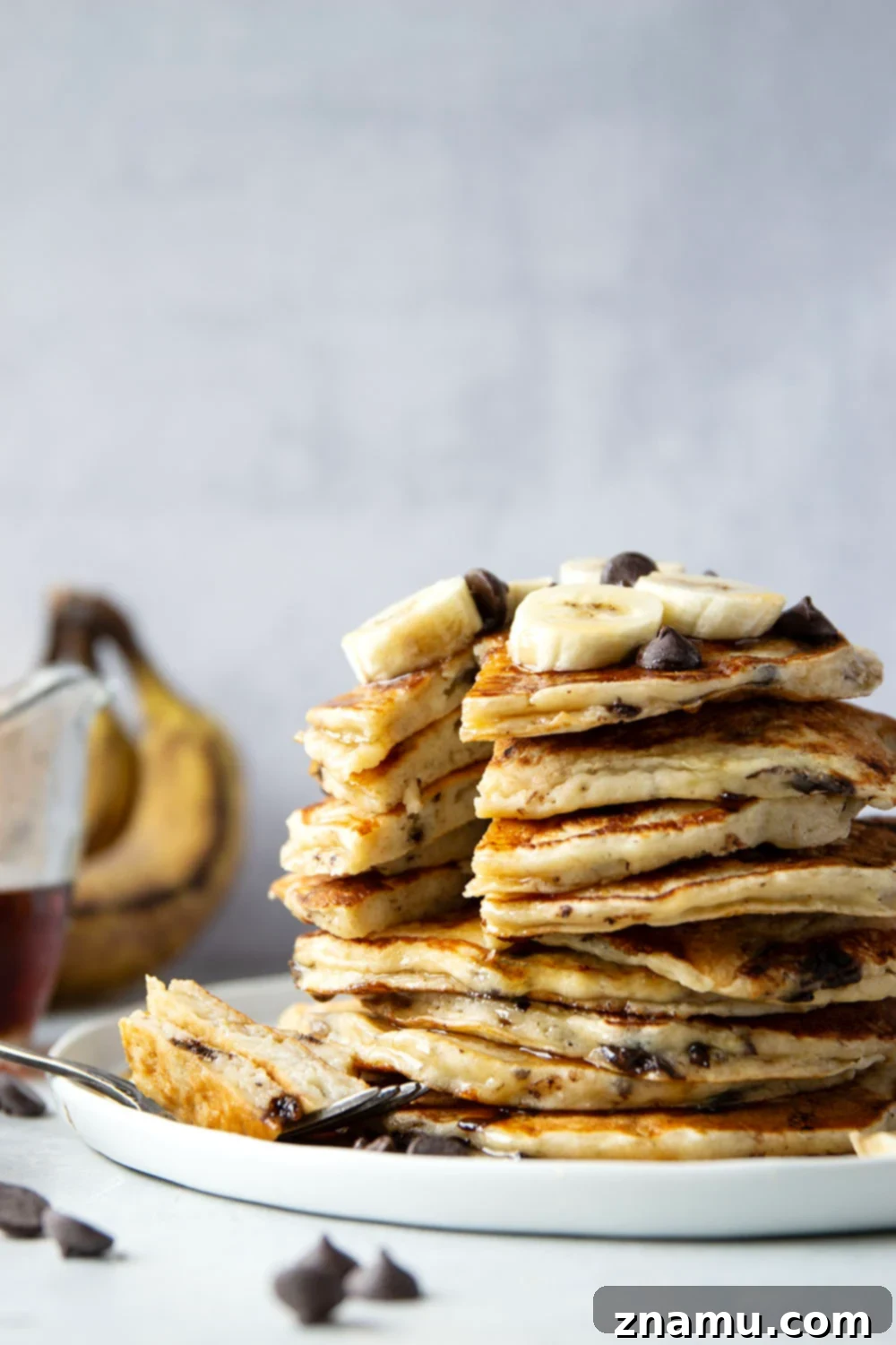 Fluffy Chocolate Banana Bliss 5 Loaded with gooey chocolate chips and lots of banana, these chocolate chip banana pancakes are thick, fluffy, and the ultimate breakfast treat!