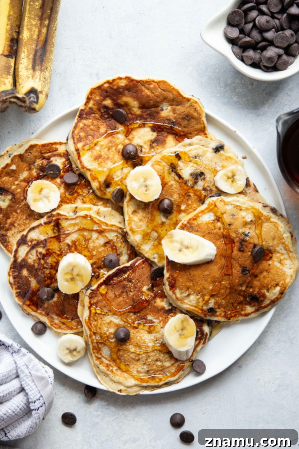 Fluffy Chocolate Banana Bliss 6 Loaded with gooey chocolate chips and lots of banana, these chocolate chip banana pancakes are thick, fluffy, and the ultimate breakfast treat!