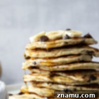 Fluffy Chocolate Banana Bliss 8 Loaded with gooey chocolate chips and lots of banana, these chocolate chip banana pancakes are thick, fluffy, and the ultimate breakfast treat!