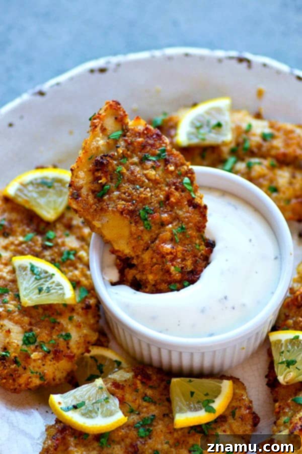 Golden-Crisp Lemon Parmesan Oven-Fried Chicken Tenders 2 Ultra-crispy on the outside and incredibly juicy on the inside, these oven-fried lemon Parmesan chicken tenders are so good and so easy, they're going to instantly become a dinner staple!