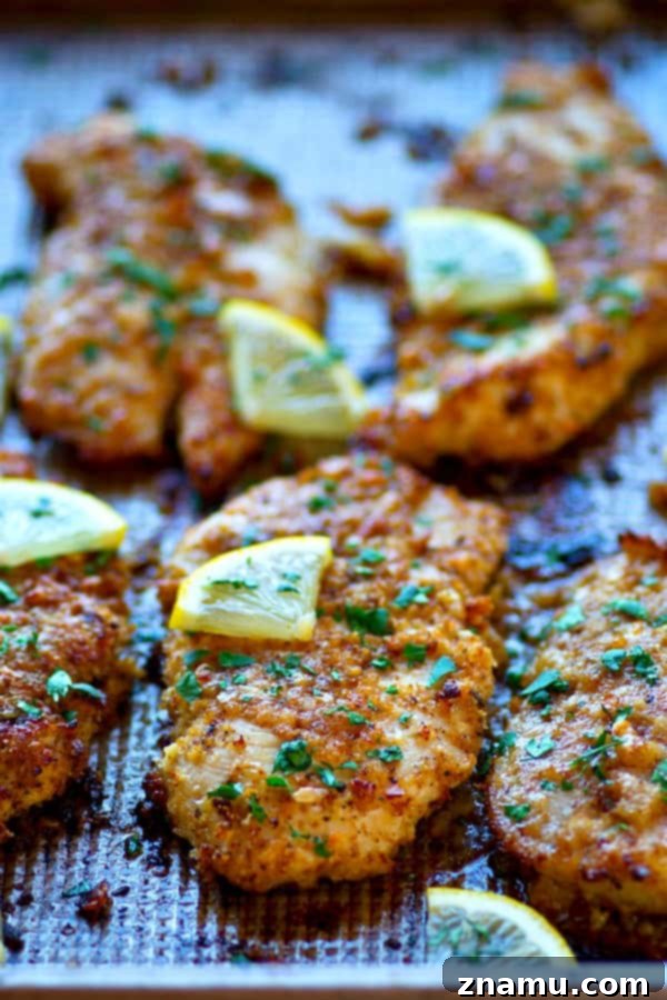 Golden-Crisp Lemon Parmesan Oven-Fried Chicken Tenders 3 Ultra-crispy on the outside and incredibly juicy on the inside, these oven-fried lemon Parmesan chicken tenders are so good and so easy, they're going to instantly become a dinner staple!