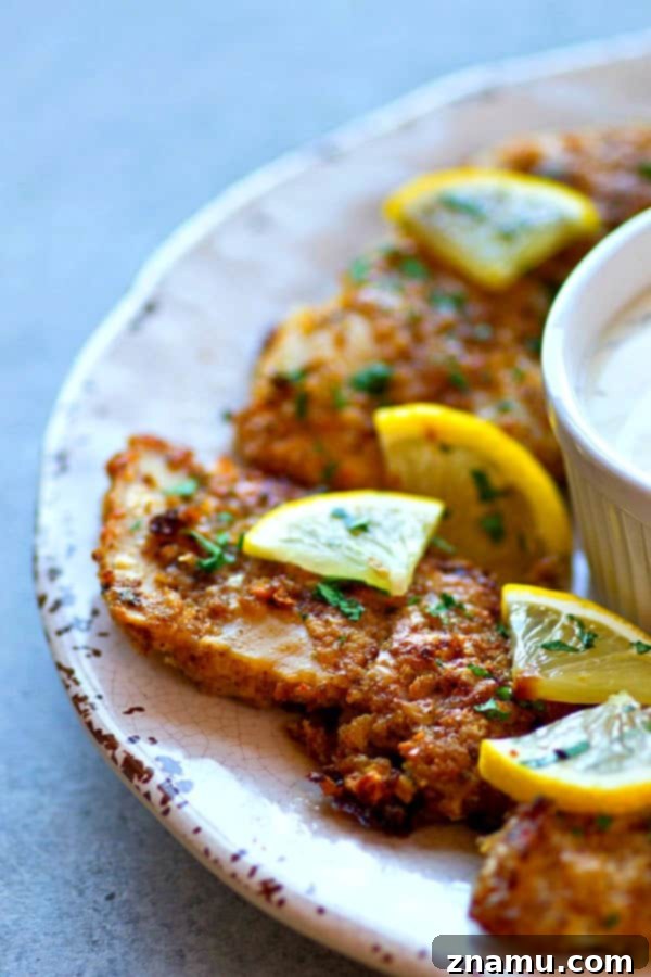 Golden-Crisp Lemon Parmesan Oven-Fried Chicken Tenders 4 Ultra-crispy on the outside and incredibly juicy on the inside, these oven-fried lemon Parmesan chicken tenders are so good and so easy, they're going to instantly become a dinner staple!