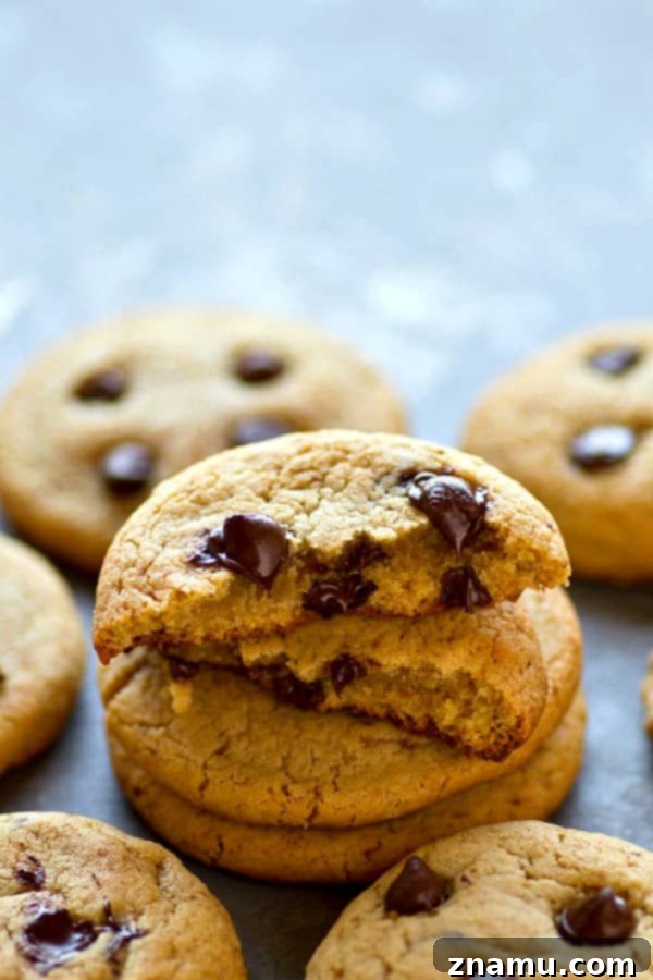 Artisan Thin and Crispy Chocolate Chip Cookies 4 A delicious pile of bakery-style thin and crispy chocolate chip cookies.