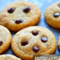 Artisan Thin and Crispy Chocolate Chip Cookies 7 Small image of a batch of thin and crispy chocolate chip cookies.