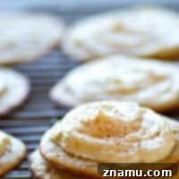 Ultra-moist Banana Bread Muffin Tops with Tangy Cream Cheese Frosting