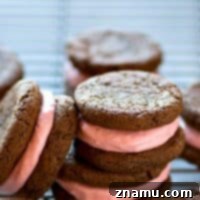Raspberry Cheesecake Stuffed Chocolate Cookies 7 Silky raspberry cheesecake frosting is sandwiched between brownie-like chocolate cookies and the rest is history. These chocolate sandwich cookies are incredibly easy to make and so gorgeous!