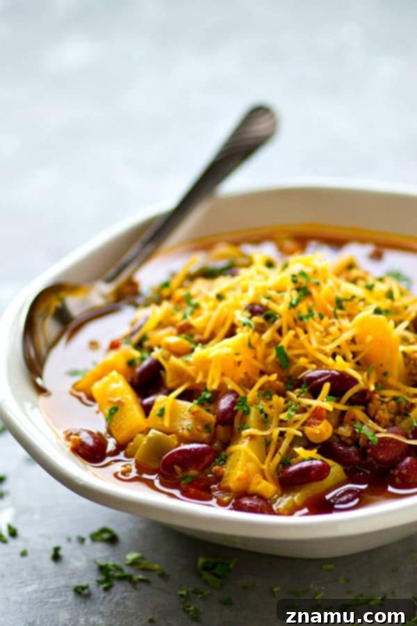 Tropical Twist Instant Pot Beef Chili 2 Delicious Instant Pot Pineapple Beef Chili garnished with fresh cilantro, ready to be served.