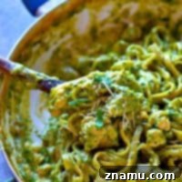 Creamy, flavorful chicken basil pesto fettuccine alfredo is made ENTIRELY in one pot in only 30 minutes and this one will quickly become your new favorite way to eat fettuccine alfredo!