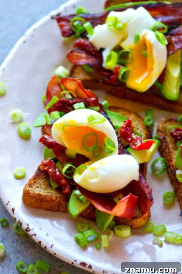 Soft Boiled Egg and Bacon Avocado Toast 2 Piled high with beautiful soft-boiled eggs and lots of crispy bacon, this bacon avocado toast is an absolute BREEZE to throw together and the ultimate stunner breakfast!