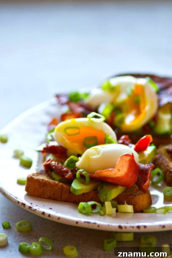 Soft Boiled Egg and Bacon Avocado Toast 3 Piled high with beautiful soft-boiled eggs and lots of crispy bacon, this bacon avocado toast is an absolute BREEZE to throw together and the ultimate stunner breakfast!