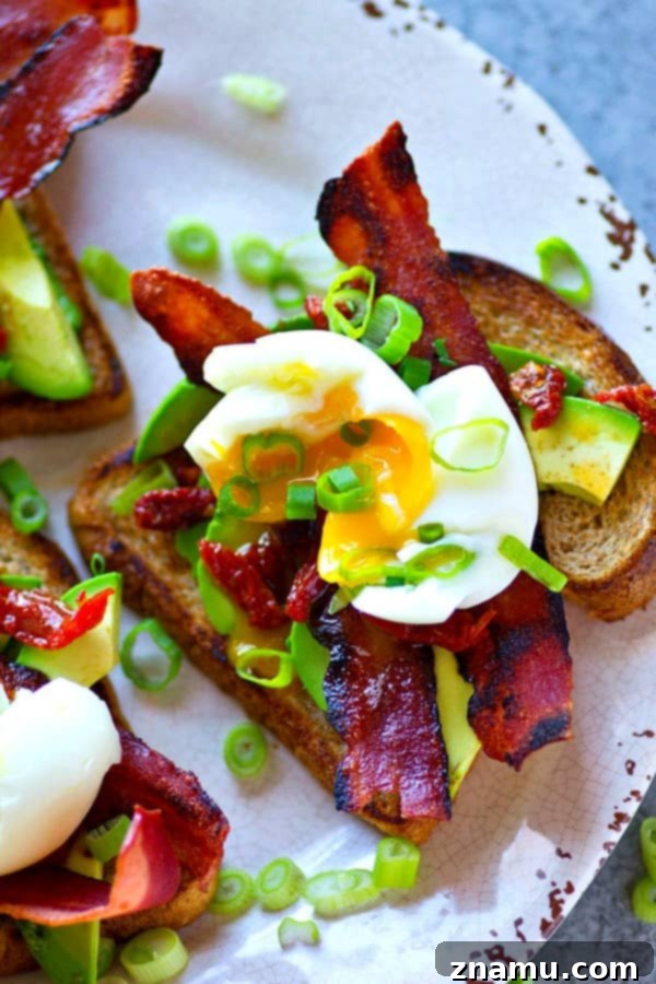 Soft Boiled Egg and Bacon Avocado Toast 4 Piled high with beautiful soft-boiled eggs and lots of crispy bacon, this bacon avocado toast is an absolute BREEZE to throw together and the ultimate stunner breakfast!