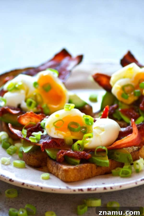 Soft Boiled Egg and Bacon Avocado Toast 5 Piled high with beautiful soft-boiled eggs and lots of crispy bacon, this bacon avocado toast is an absolute BREEZE to throw together and the ultimate stunner breakfast!