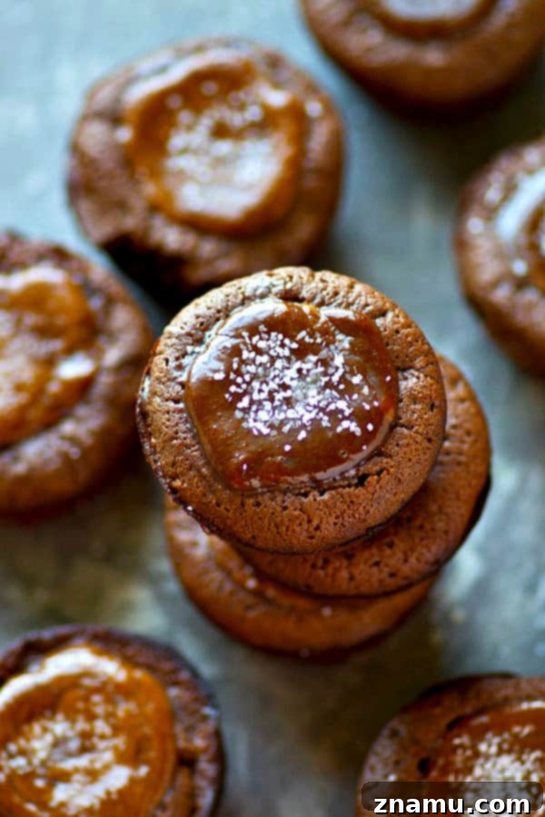 Decadent dark chocolate salted caramel brownie cups, freshly baked and ready to be filled.