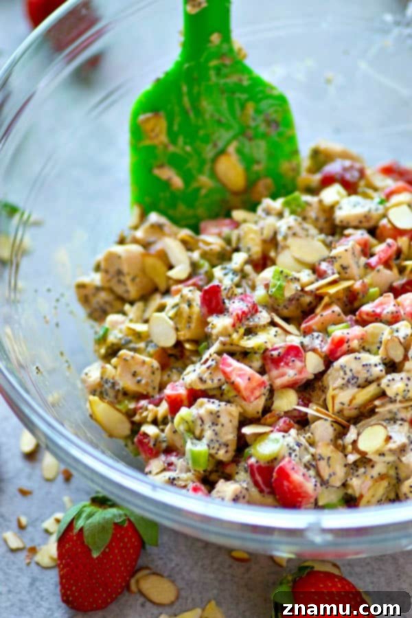 Toasted Almond Poppyseed Chicken Salad with Sweet Strawberries 3 Juicy strawberries and crunchy almonds and poppyseeds make for the BEST trio in this gorgeous and incredibly easy strawberry almond poppyseed chicken salad! Perfect for any spring gathering.