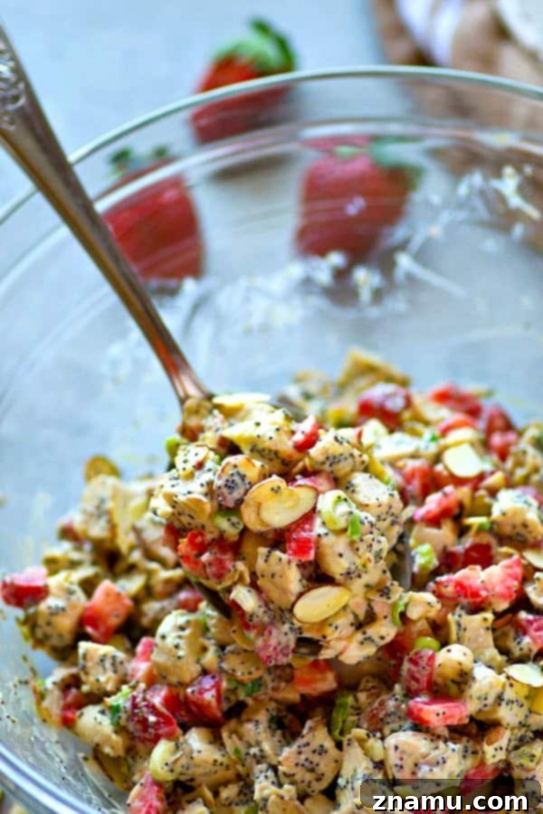 Toasted Almond Poppyseed Chicken Salad with Sweet Strawberries 4 Juicy strawberries and crunchy almonds and poppyseeds make for the BEST trio in this gorgeous and incredibly easy strawberry almond poppyseed chicken salad! Perfect for any spring gathering.