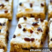 Frosted Oatmeal Raisin Morning Bars 7 Soft, chewy and packed with tons of oats and raisins, these frosted oatmeal raisin breakfast bars are the ULTIMATE grab 'n' go breakfast!