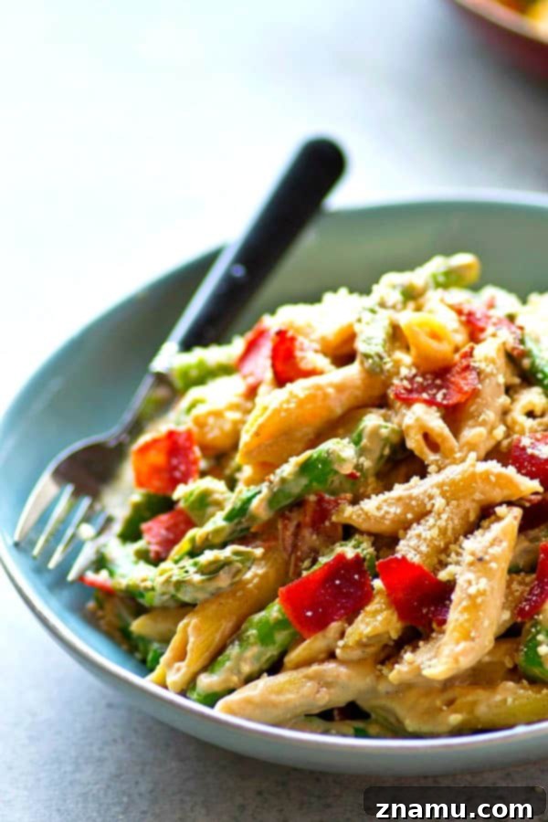 Asparagus Bacon Browned Butter Alfredo Penne ready to be served