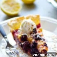 Layered with fresh blackberry sauce and a tangy homemade lemon curd, this twist on coconut cream pie is a gorgeous dessert for any occasion and the trio of flavors is mind-blowing!