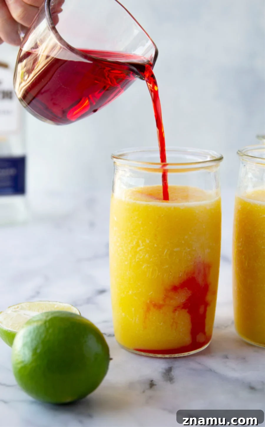 Spiked Sunrise Slush 5 These tequila sunrise slushies are a frozen twist off of the classic cocktail and they're SO easy to blend up!