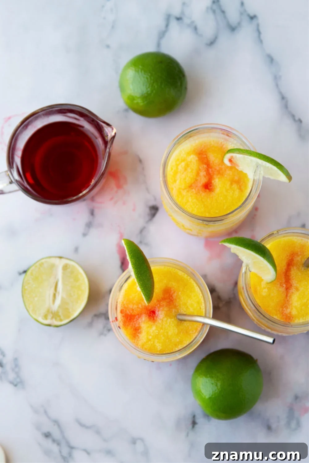 Spiked Sunrise Slush 6 These tequila sunrise slushies are a frozen twist off of the classic cocktail and they're SO easy to blend up!
