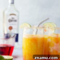 Spiked Sunrise Slush 8 These tequila sunrise slushies are a frozen twist off of the classic cocktail and they're SO easy to blend up!
