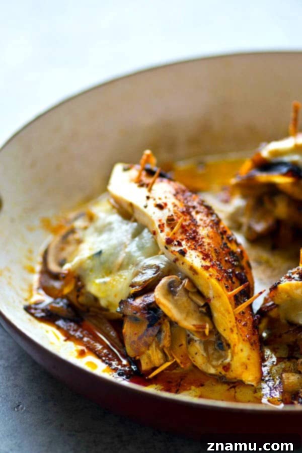 Golden Onion, Mushroom, and Swiss Stuffed Chicken Breasts 2 Stuffed with flavorful caramelized onions, mushrooms and gooey swiss cheese, these stuffed chicken breasts are WAY easier than they look and the perfect way to up your chicken game!