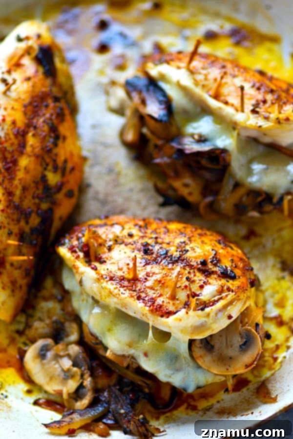 Golden Onion, Mushroom, and Swiss Stuffed Chicken Breasts 3 Stuffed with flavorful caramelized onions, mushrooms and gooey swiss cheese, these stuffed chicken breasts are WAY easier than they look and the perfect way to up your chicken game!