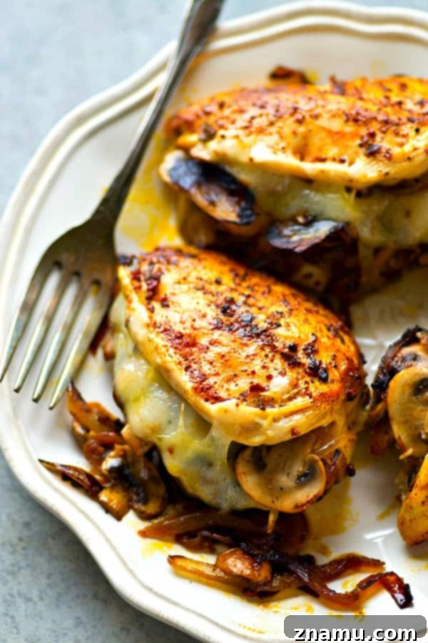 Golden Onion, Mushroom, and Swiss Stuffed Chicken Breasts 4 Stuffed with flavorful caramelized onions, mushrooms and gooey swiss cheese, these stuffed chicken breasts are WAY easier than they look and the perfect way to up your chicken game!