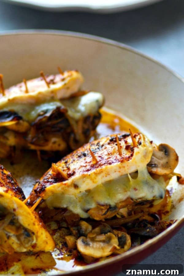 Golden Onion, Mushroom, and Swiss Stuffed Chicken Breasts 5 Stuffed with flavorful caramelized onions, mushrooms and gooey swiss cheese, these stuffed chicken breasts are WAY easier than they look and the perfect way to up your chicken game!