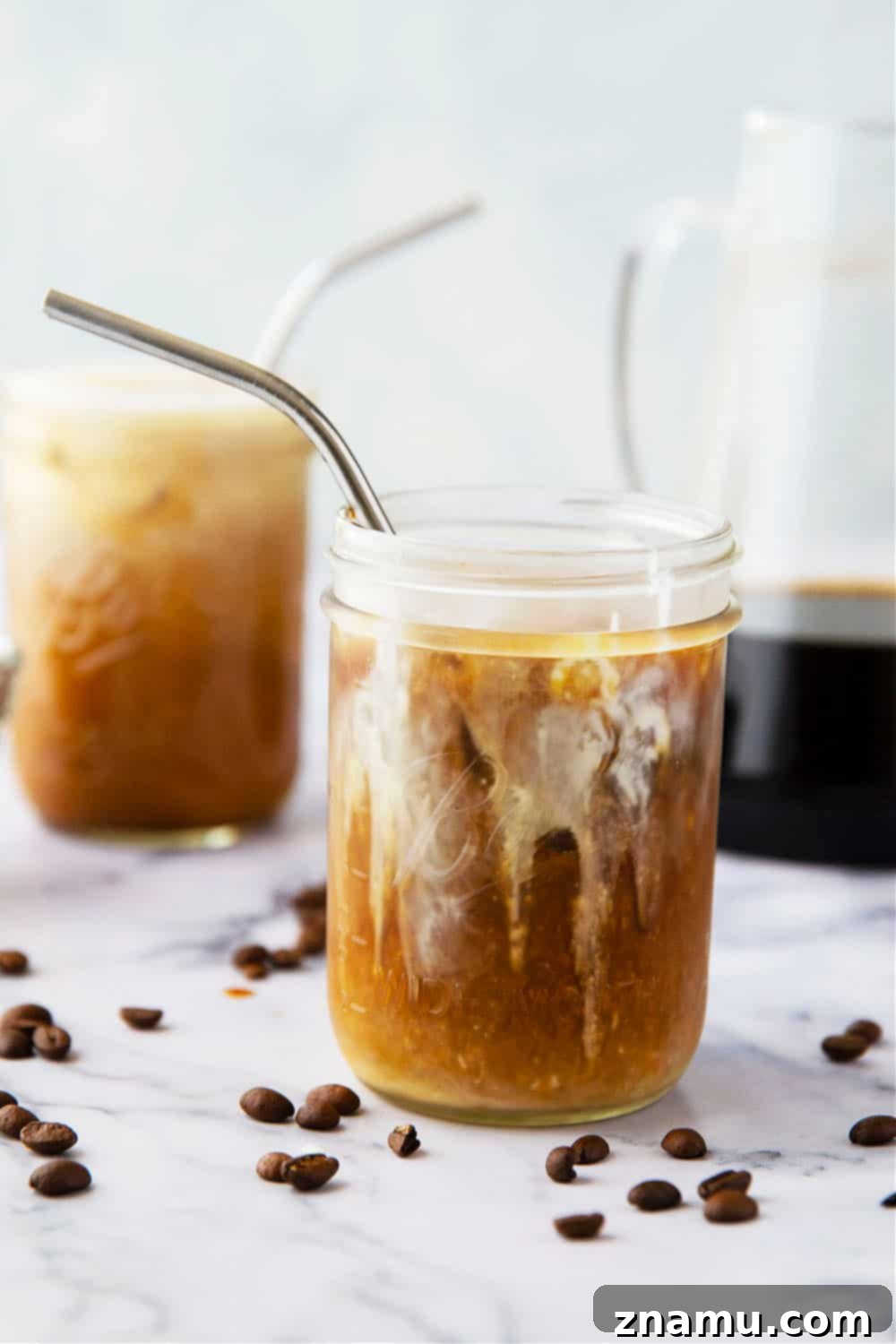 Overnight Velvet Brew 2 Classic coffee shop-style cold brew coffee is SO unbelievably easy to make at home you'll never go back to buying it. This overnight cold brew coffee is a keeper recipe for any coffee lover!
