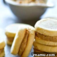 Stacked vanilla wafer caramel sandwich cookies, seen from an appetizing angle