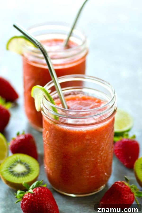 Juicy strawberries and tangy kiwi are the perfect match in these refreshing strawberry kiwi agua fresca cocktails. Make a huge pitcher for the perfect night of summer sipping!