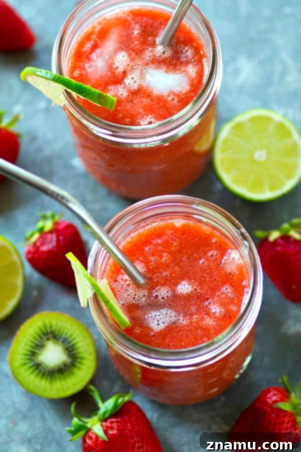 Juicy strawberries and tangy kiwi are the perfect match in these refreshing strawberry kiwi agua fresca cocktails. Make a huge pitcher for the perfect night of summer sipping!