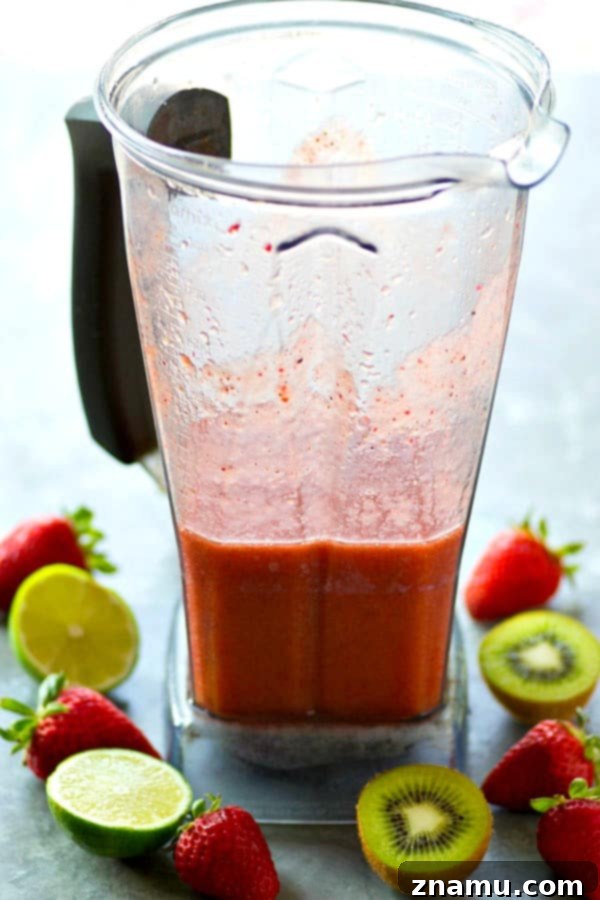 Juicy strawberries and tangy kiwi are the perfect match in these refreshing strawberry kiwi agua fresca cocktails. Make a huge pitcher for the perfect night of summer sipping!