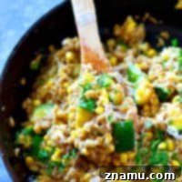 This seasonal sweet corn zucchini Parmesan risotto is super-creamy and packed with tender zucchini and fresh sweet corn. Made entirely in one skillet in only 30 minutes!