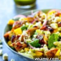 Honey-Garlic Grilled Chicken with Tropical Mango Salad and Zesty Cilantro Dressing 7 Sweet 'n' sticky grilled honey garlic chicken is a perfect match with sweet mango and flavorful cilantro dressing in this gorgeous grilled chicken mango salad!