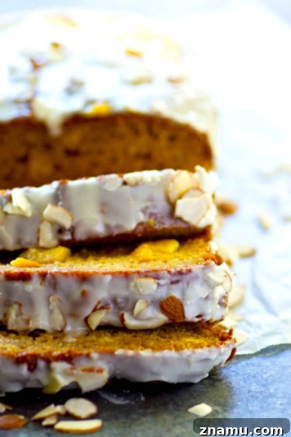 Peach Amaretto Quick Bread with Vanilla Glaze 4 Sliced amaretto peach quick bread with glaze