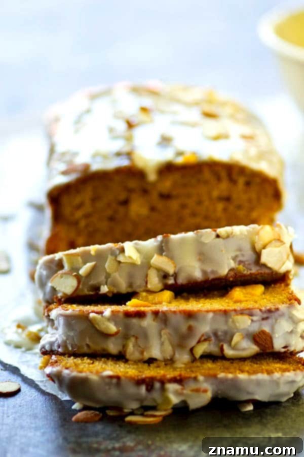 Peach Amaretto Quick Bread with Vanilla Glaze 5 Amaretto peach quick bread drizzled with glaze and almonds