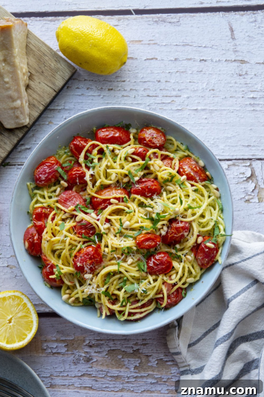 Lemon-Kissed Basil Pesto Spaghetti with Sweet Burst Tomatoes 6 This lemon basil pesto spaghetti features flavorful homemade lemon basil pesto and juicy bursting cherry tomatoes. - a perfect summer side dish with grilled meat!