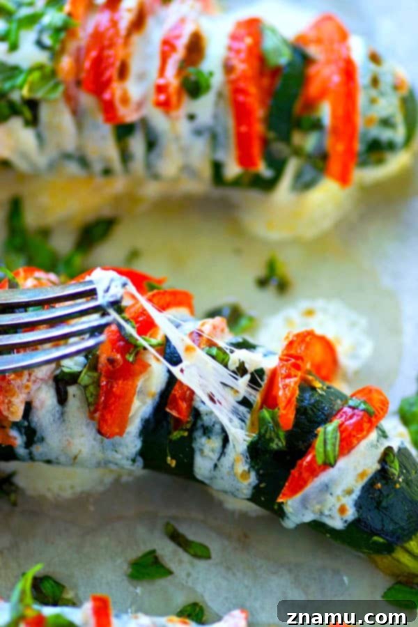 Savory Hasselback Caprese Zucchini Boats 4 These hasselback caprese zucchini boats are stuffed with juicy tomato slices, gooey mozzarella, and tons of fresh basil for a seasonal veggie side that's LOADED with summer flavors!
