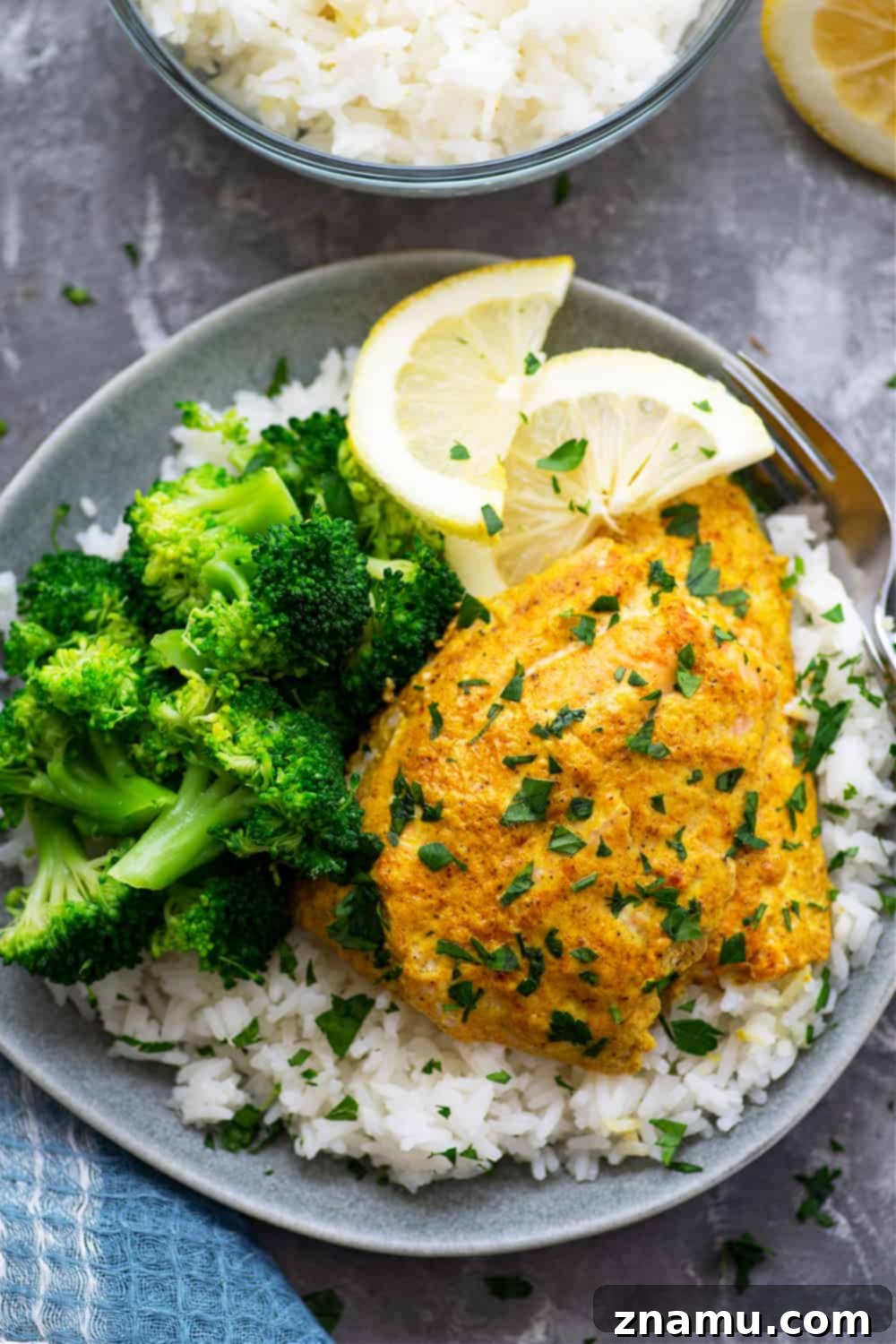 Tandoor-Kissed Salmon, Zesty Lemon Basmati 4 Traditional grilled tandoori salmon is marinated in a spiced yogurt marinade, grilled until tender, and piled on top of fluffy lemon basmati rice.--it'll quickly become a dinner regular!