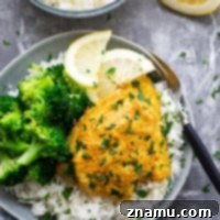 Tandoor-Kissed Salmon, Zesty Lemon Basmati 7 Traditional grilled tandoori salmon is marinated in a spiced yogurt marinade, grilled until tender, and piled on top of fluffy lemon basmati rice.--it'll quickly become a dinner regular!