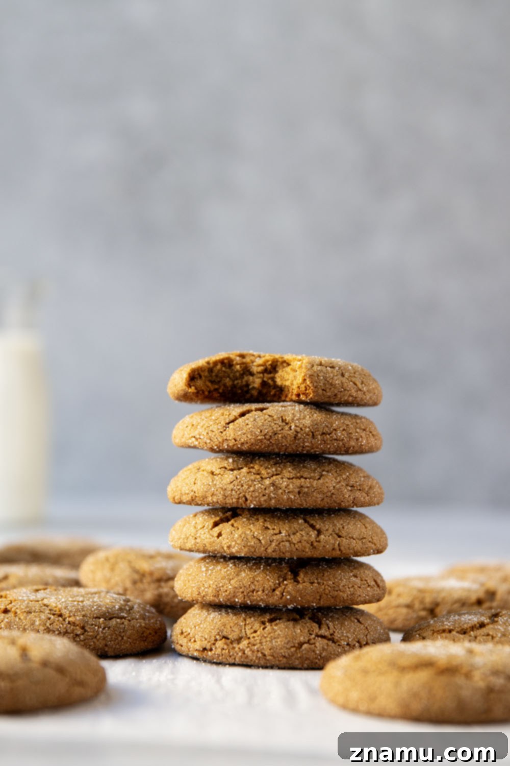 Zingy Gingersnap Crunch 5 Freshly baked crispy gingersnap cookies on a baking sheet