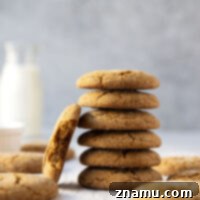 Perfectly thin and crispy gingersnap cookies are a Christmas essential and these easy gems will quickly become a cookie jar favorite!
