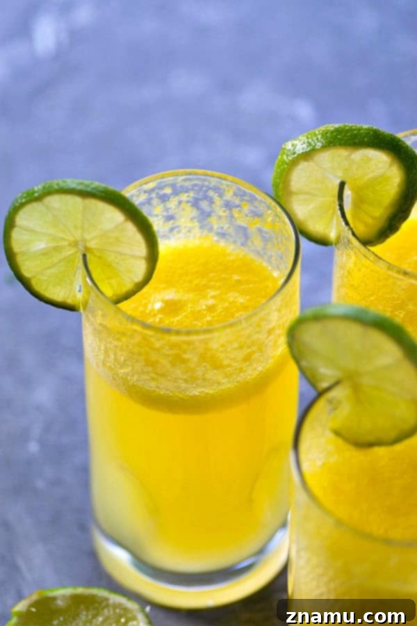 Tropical Zest Mule 3 These mango lime moscow mules are a refreshing tropical twist on a classic! Only four ingredients needed and they're SO easy to mix up for a winner weekend sipper.