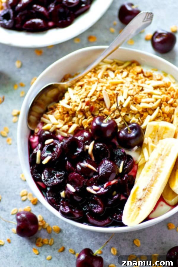 Warm Roasted Cherry and Banana Yogurt Bowls with Granola 5 Juicy roasted cherries and sliced bananas are the ultimate breakfast combo in these granola yogurt bowls! Fast and nutritious for a busy morning breakfast.