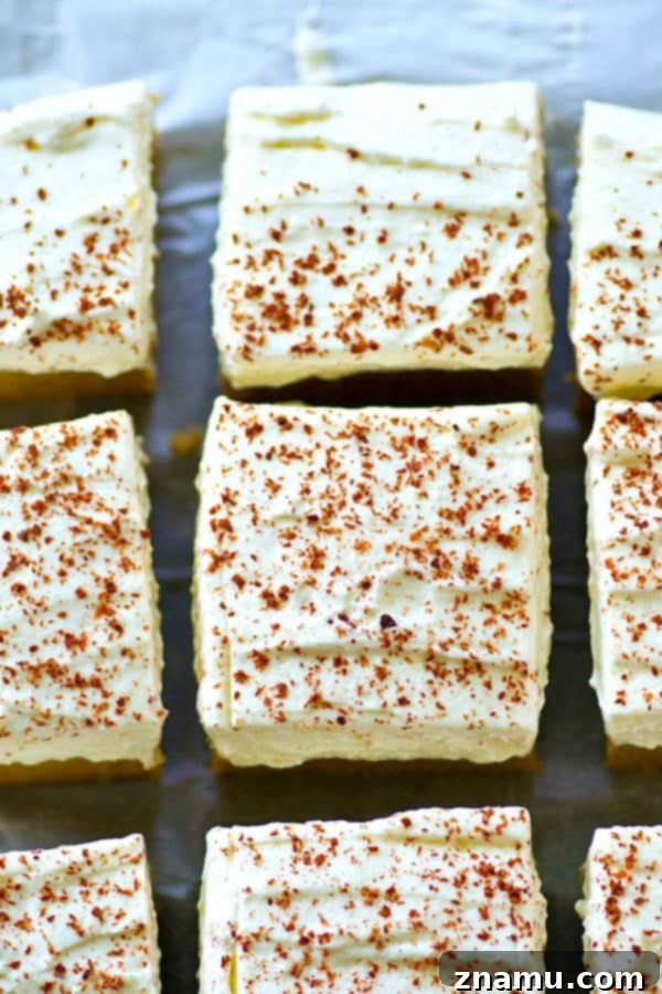 Frosted Coffee Frappuccino Sheet Cake with a tall layer of cream cheese frosting, appealing to coffee lovers and those on a gluten-free or THM diet