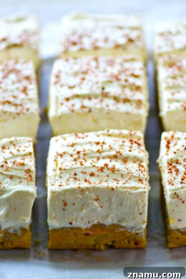 Close-up of a slice of Frosted Coffee Frappuccino Sheet Cake showing its moist texture and thick frosting, gluten-free and THM-friendly